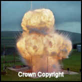 A powder explosion. Marked Crown Copyright.